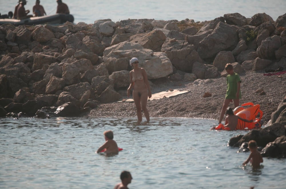 FKK cove pyramid in waters - Naturism teaches respect for the body—both your own and others