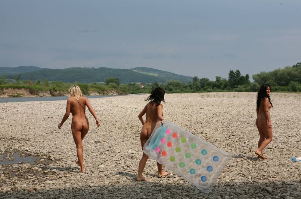Naturist Park Floating On River photos - Nudism strengthens friendships and mutual respect among people