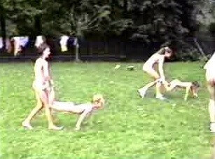 A nudist gathering at the stadium and sports - A closed community of naturists