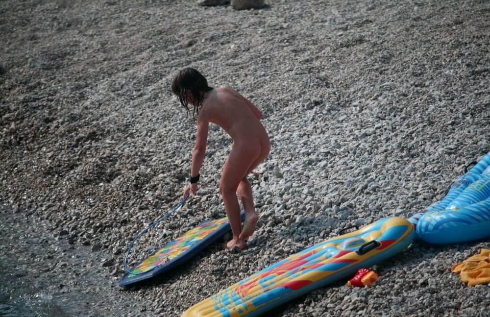 Naturist Surf Board Glides pics - The sacred nature of the nude human form among naturists