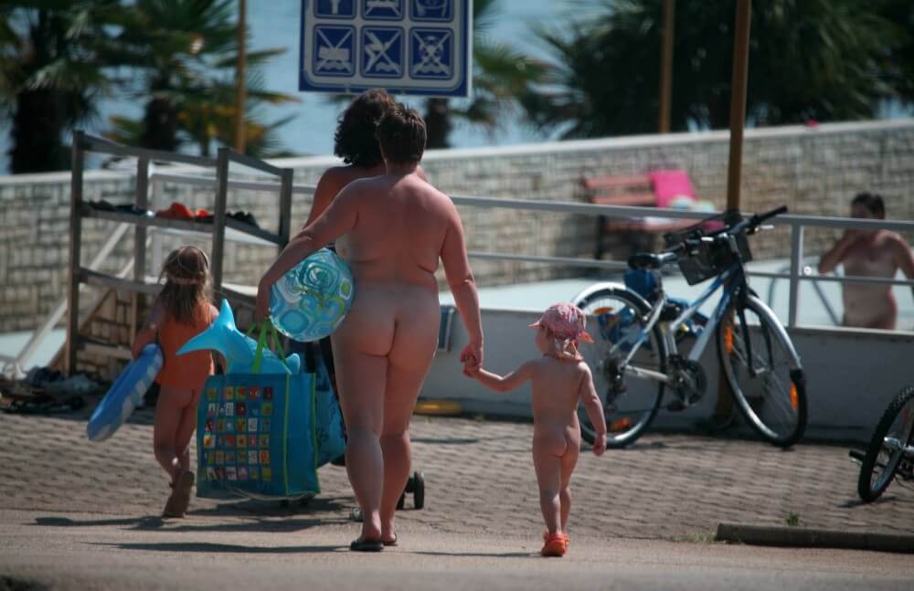 Pool Outskirt Nude Guests pics - Living in harmony with nature as the primary goal of the naturist lifestyle